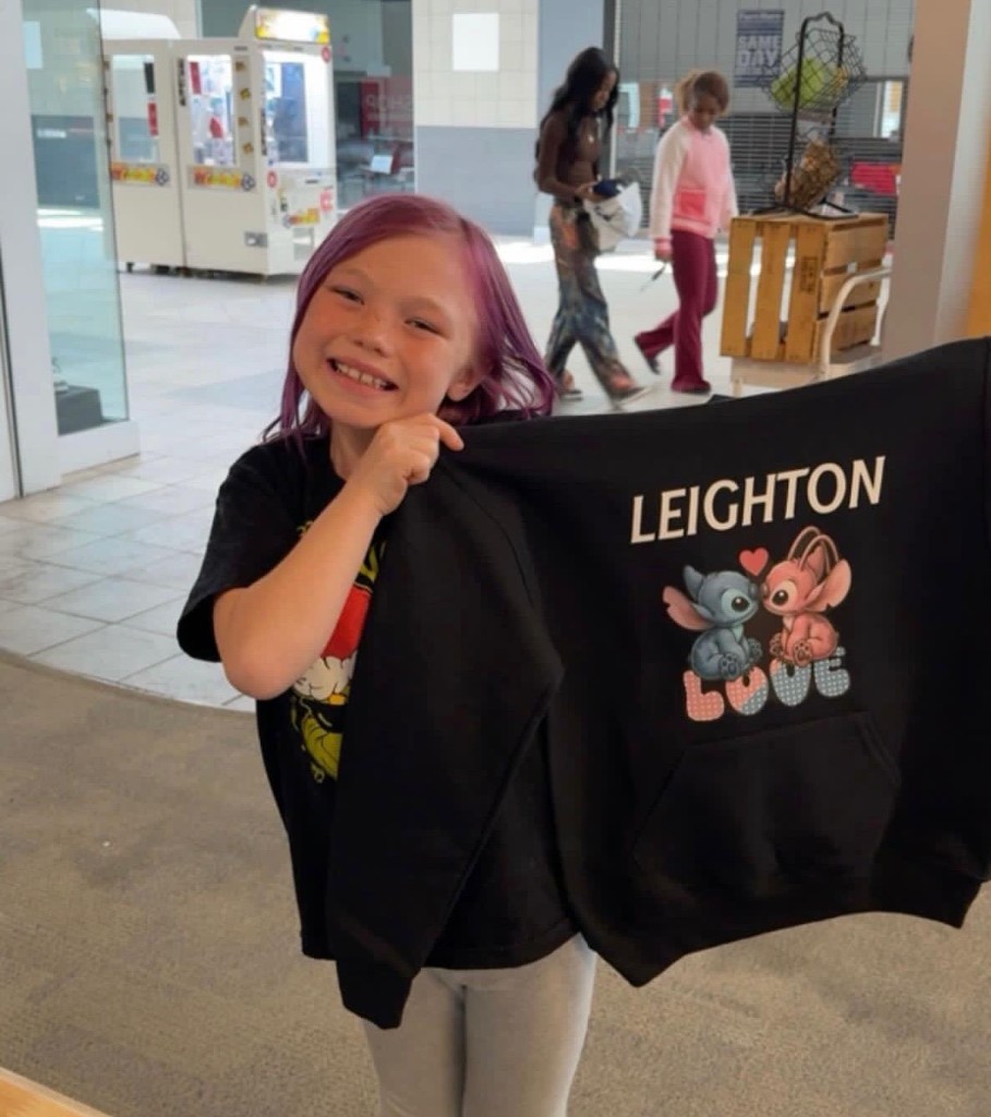 Happy customer with custom hoodie