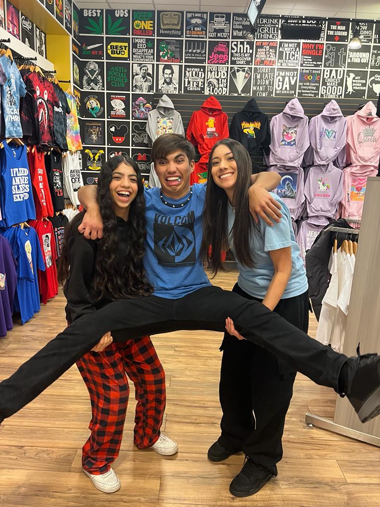 Friends having fun in CustoMo store